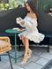 Фото №1 з 12 товару Муслінова сукня з довгим рукавом Молочна в квіти 121/23 молочний в персикові квіти