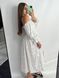Фото №2 з 9 товару Жіноча муслінова сукня міді молочна в ніжні квіти V.Velika 124/23 молочний в персикові квіти