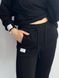 Фото №4 з 10 товару Чорний жіночий трикотажний спортивний костюм Бавовна Футер Петля 130/23 чорний