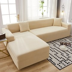 Фото Кремовий трикотажний чохол на кутовий диван